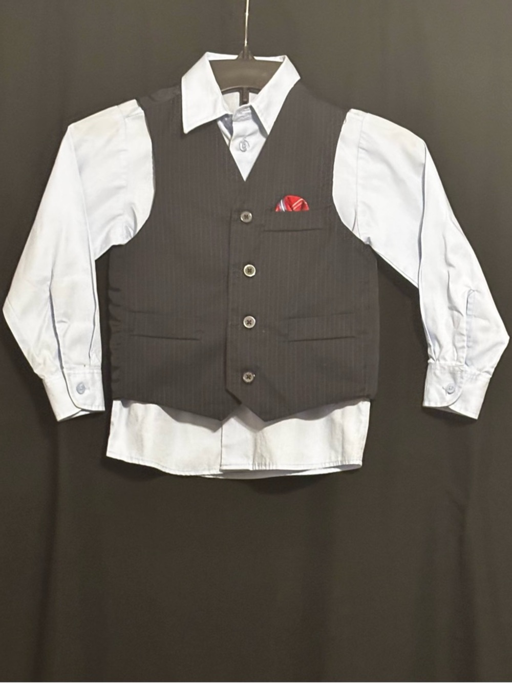 George Light Blue Dress Shirt with Black vest & red handkerchief.